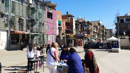 26-08 migrantes barrio mugica